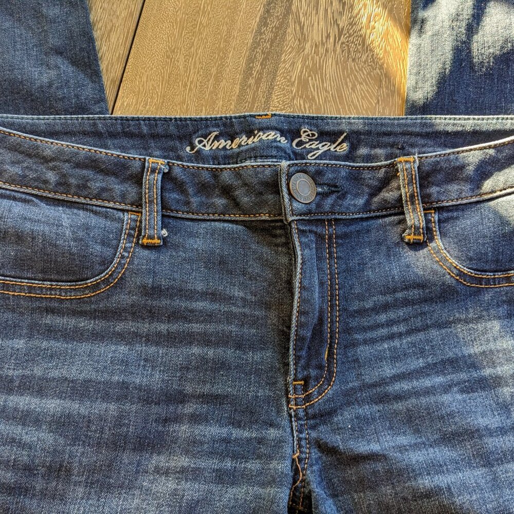 American Eagle Stretch Jegging Mock Front Pockets Medium Wash Distress, Size 14